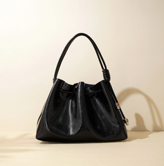 glossy drawstring shoulder bag with knot detail – SIENNA