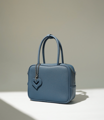 black boxy handbag with heart charm – LYRA