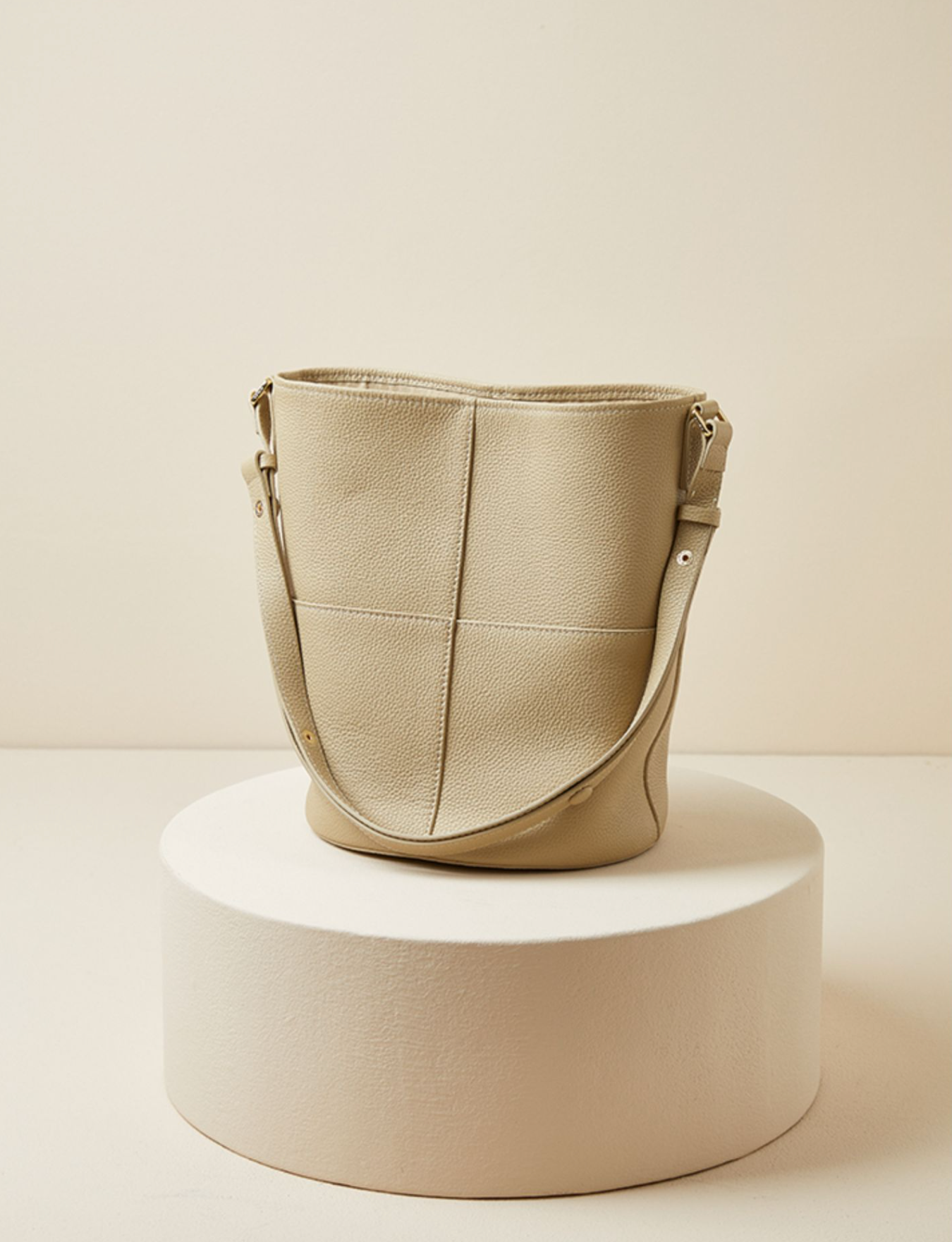 pebbled leather bucket bag with adjustable strap – NOQ