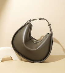 crescent-shaped leather shoulder bag with top zip – OLIVEA