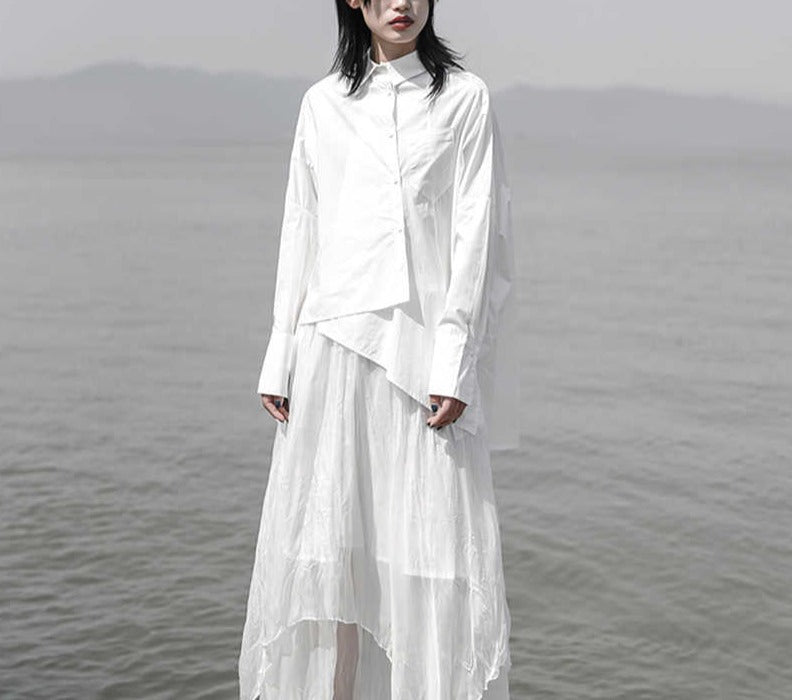 asymmetrical oversized shirt with draped hem - Taura