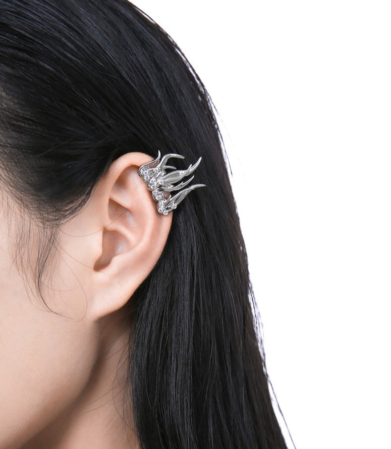 flame-shaped silver earrings with crystal accents –Eimvcan