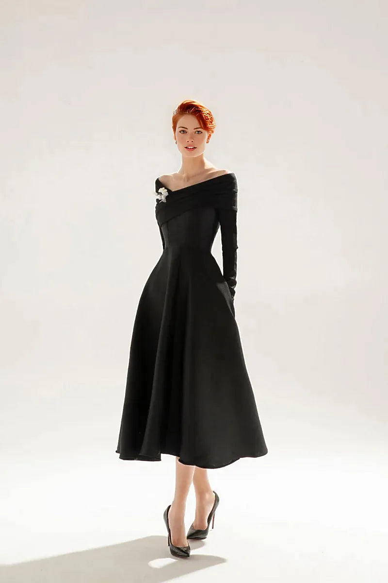 off-shoulder midi dress with floral brooch – Sarien