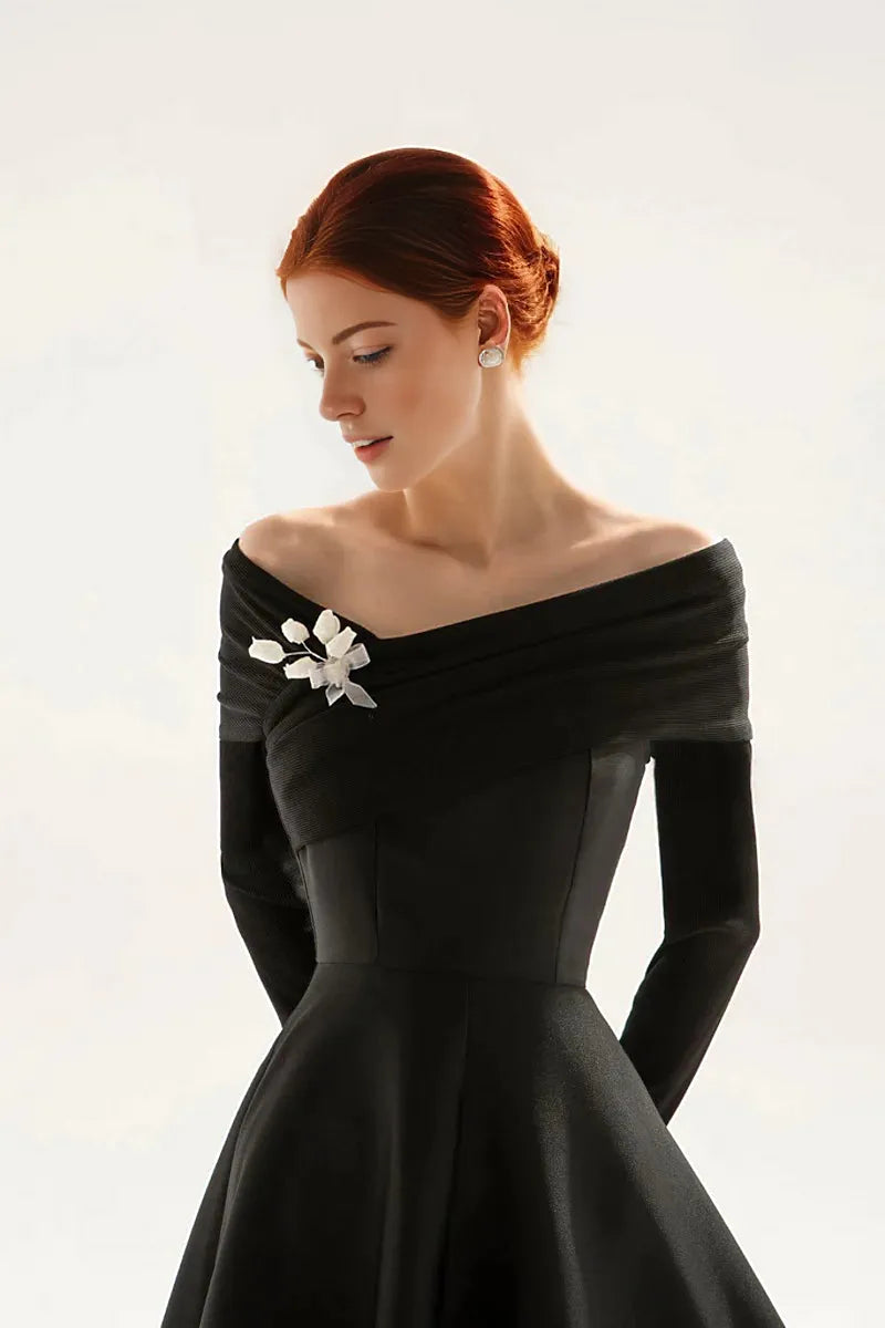 off-shoulder midi dress with floral brooch – Sarien