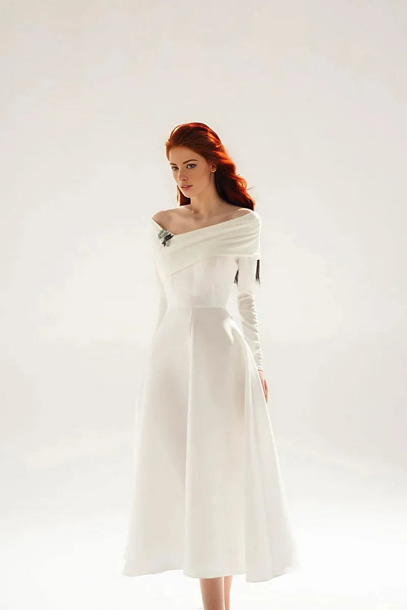 off-shoulder midi dress with floral brooch – Sarien