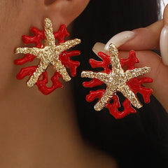 Coral-inspired statement earrings with textured star detail - Cinma