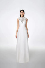 Sleeveless gown with embellished high neckline – Zobia