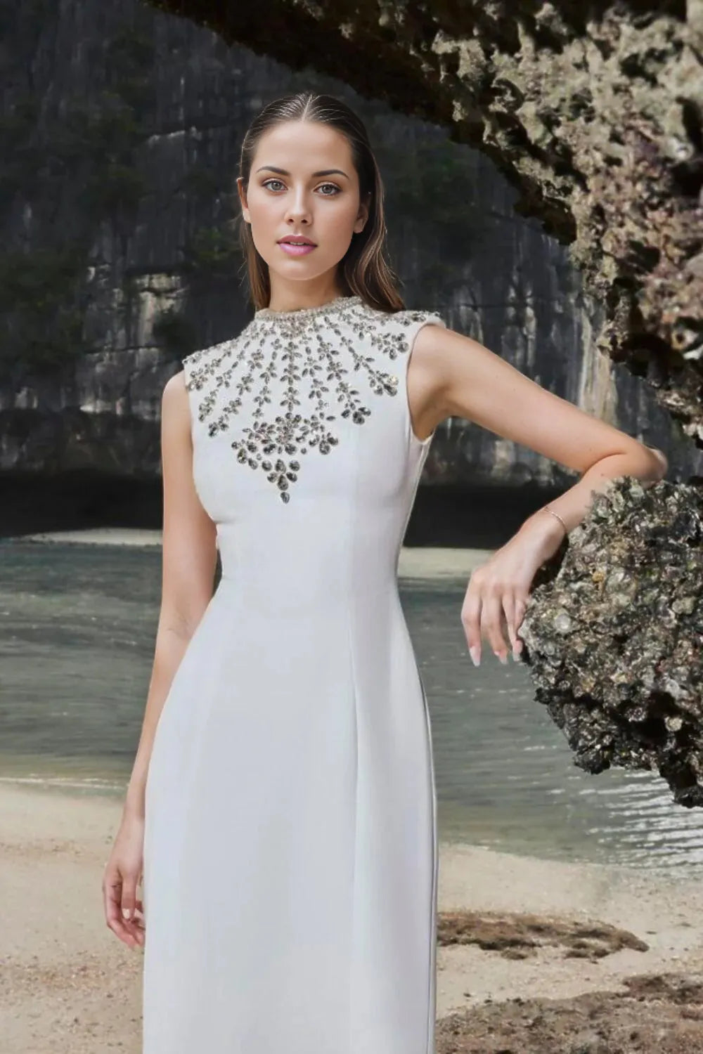 Sleeveless gown with embellished high neckline – Zobia