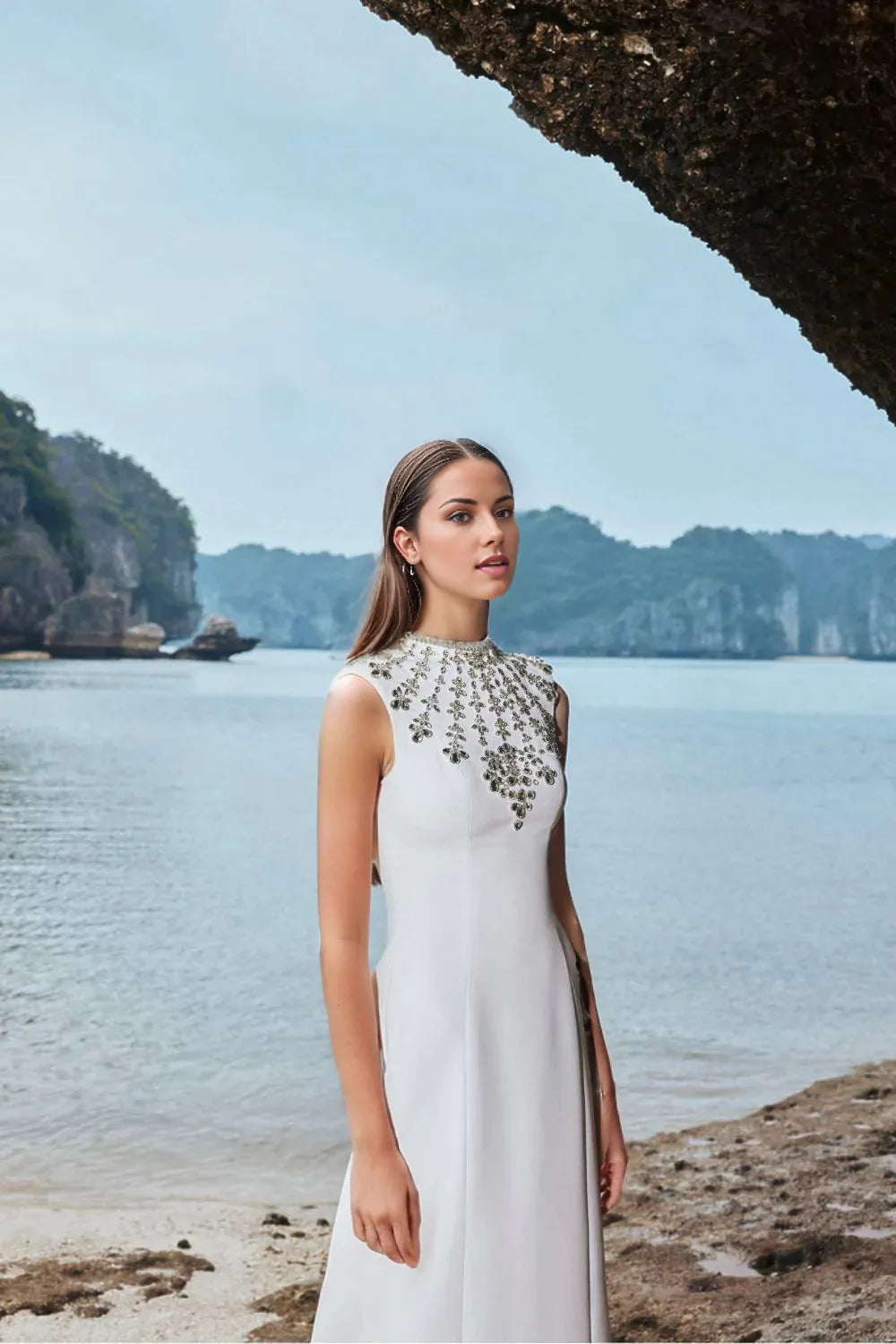Sleeveless gown with embellished high neckline – Zobia