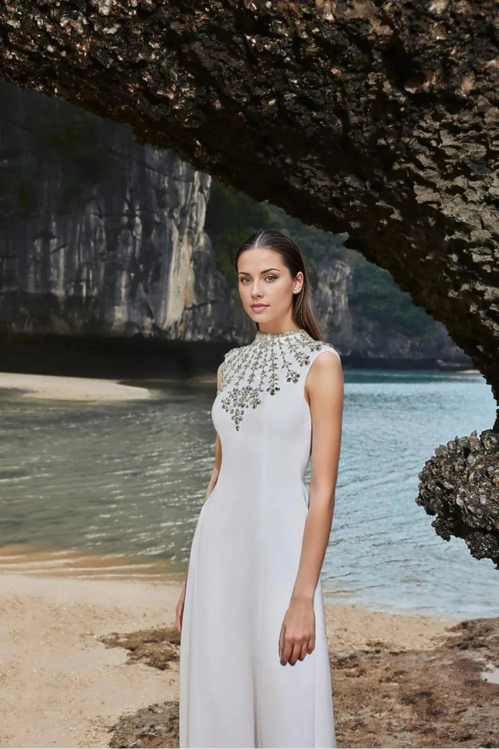 Sleeveless gown with embellished high neckline – Zobia
