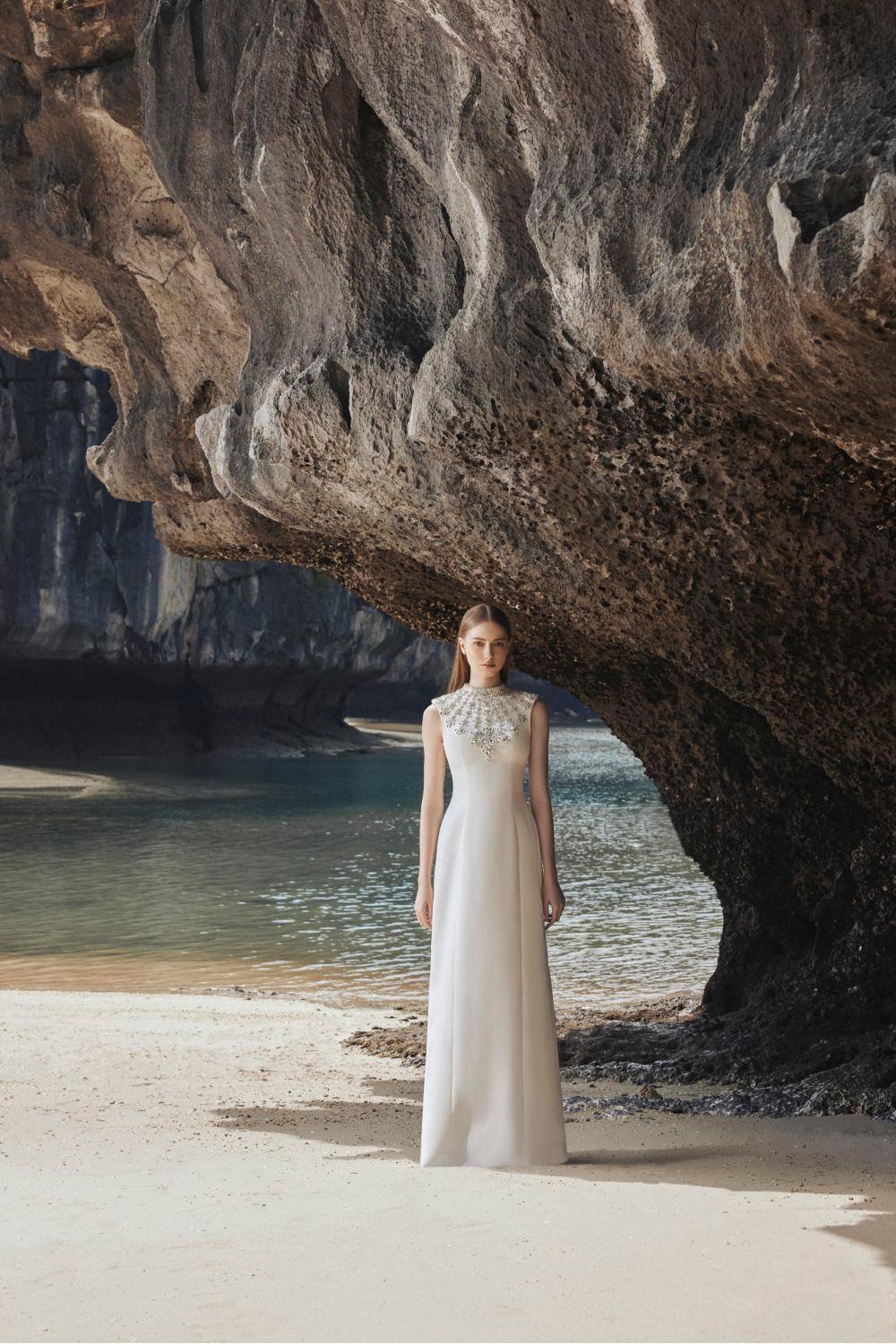 Sleeveless gown with embellished high neckline – Zobia