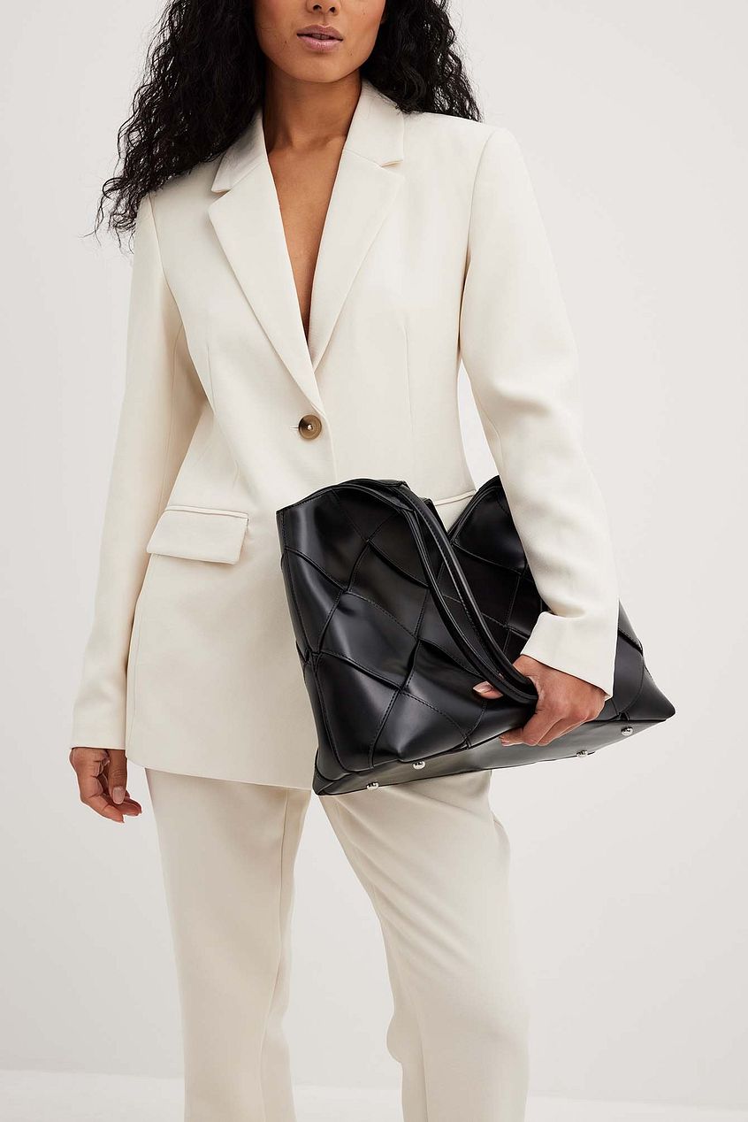 geometric shoulder bag with glossy patchwork finish – ARYXA