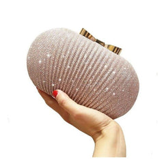 glittering shell clutch with bow clasp - Rochana