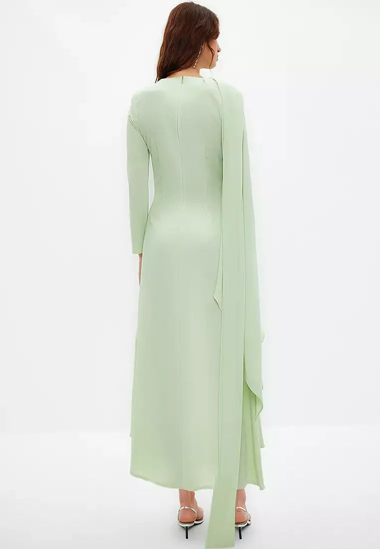 Asymmetric sleeve gown with draped scarf detail – Norden